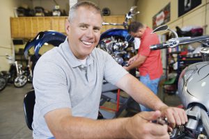 Mechanic Working on Motorcycle